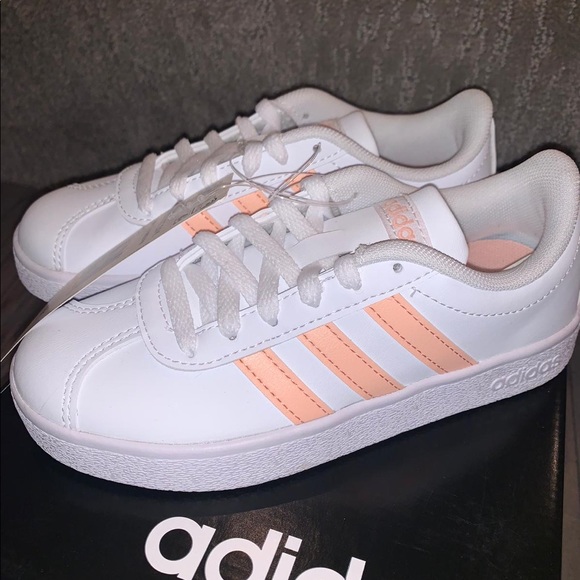 white adidas shoes with pink